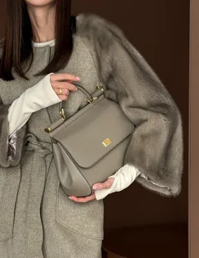 Женское пальто с меховыми рукавами из норки - фото 1